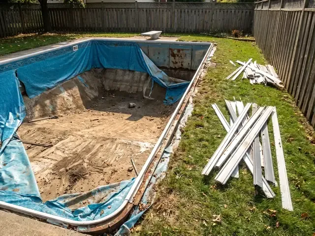 A vinyl liner cut away from the steel wall panels